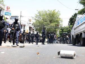 Policía niega que sus agentes lanzaran gases lacrimógenas contra sede del PLD