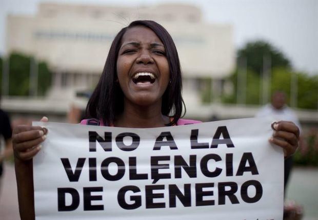 Mujer protesta contra violencia de género. 