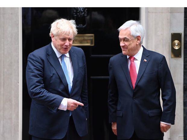 Boris Johnson y Sebastián Piñera.