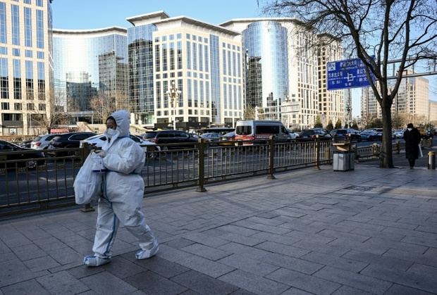 China pone fin a la cuarentena obligatoria de entrada al país en plena crisis de co
vid.