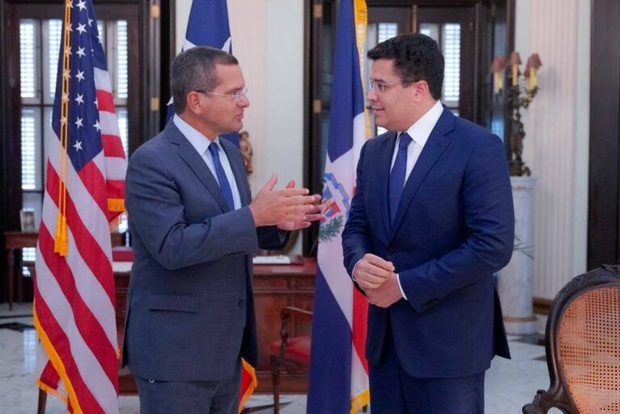 Pedro Pierluisi junto a David Collado.