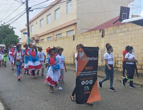 Participación de niños y niñas del municipio Quisqueya en celebración marcha en contra matrimonio infantil.
