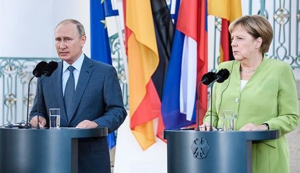 Putín y Merkel