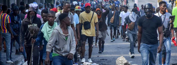 Incertidumbre y tensión en la jornada en que Henry debería abandonar el poder en Haití.