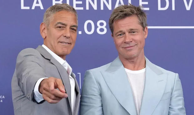 Brad Pitt y George Clooney en el Festival de Venecia.