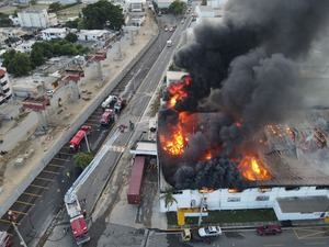 Sistema 911 coordina asistencia de incendio en zona franca de Rafey