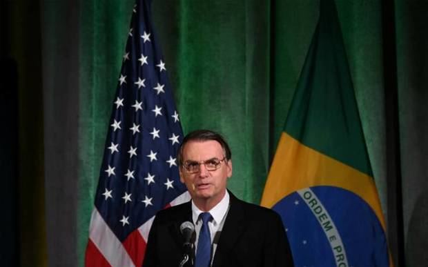 Bolsonaro celebra en Washington su conservadurismo y afinidad con Trump