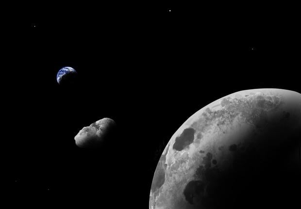 Impresión artística del cuasi-satélite terrestre Kamo`oalewa cerca del sistema Tierra-Luna.
