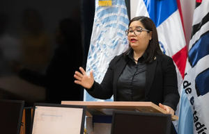 Mildred Martínez, directora general de la ONE al momento de su ponencia.