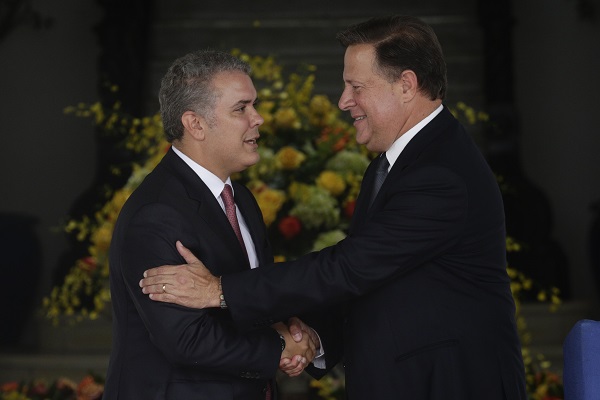 Iván Duque y Juan Carlos Varela