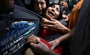 Carol Guzy gana el World Press Photo del Año con imagen sobre deportaciones en EEUU