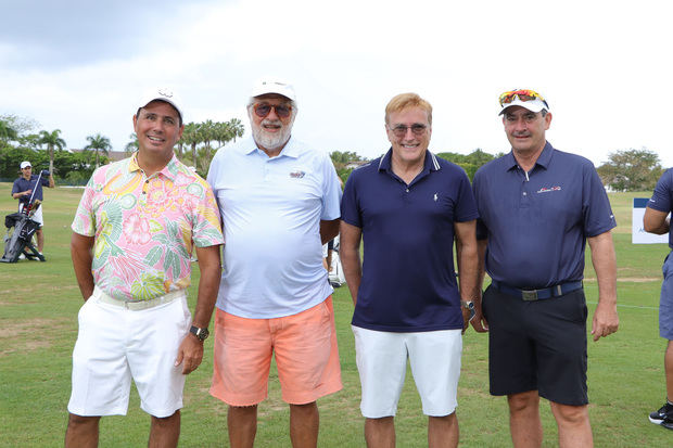 Participantes del torneo de golf.